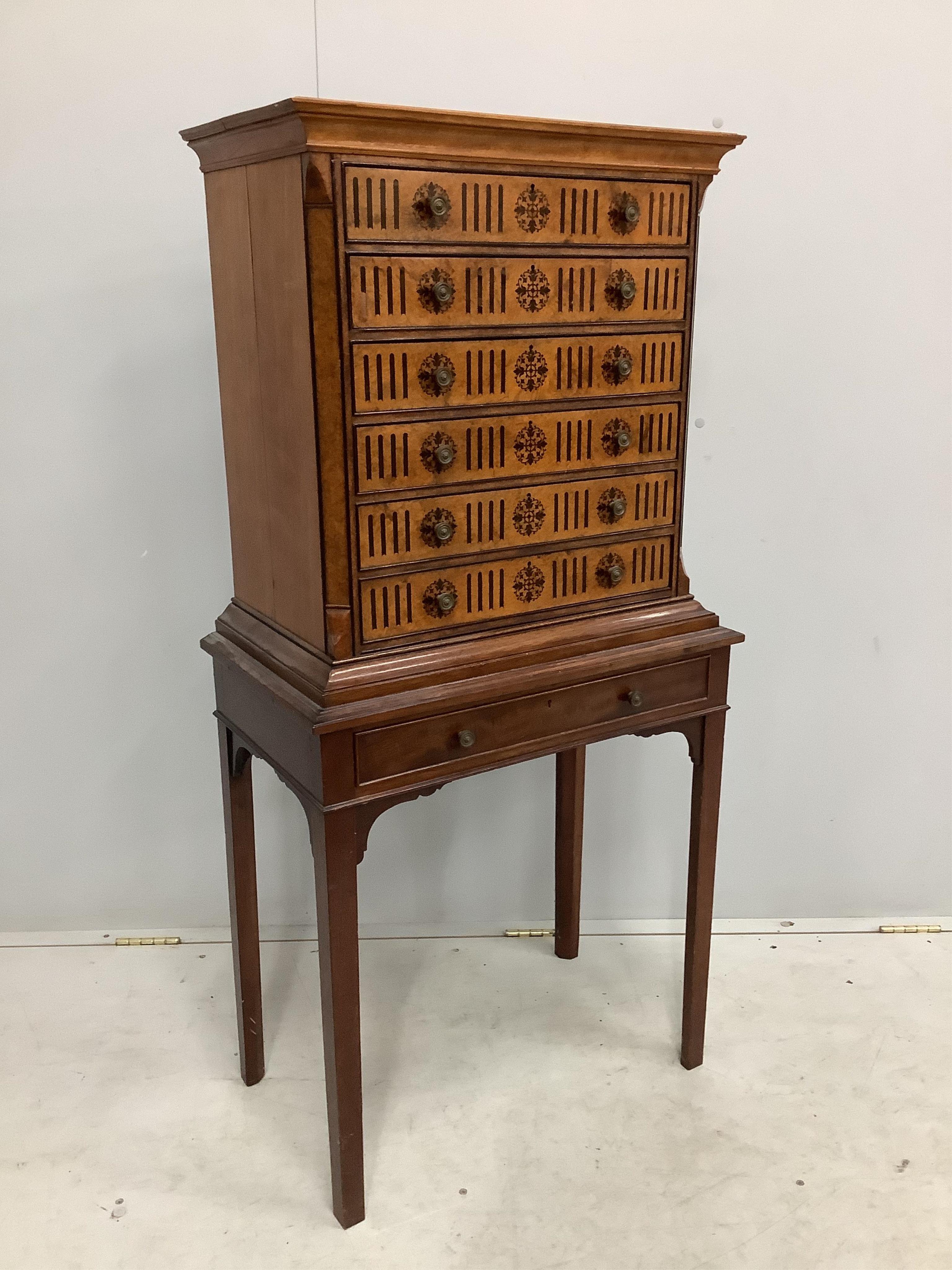 A late Victorian ebony inlaid bird's eye maple and mahogany collector’s chest on later stand, width 62cm, depth 36cm, height 128cm. Condition - fair to good